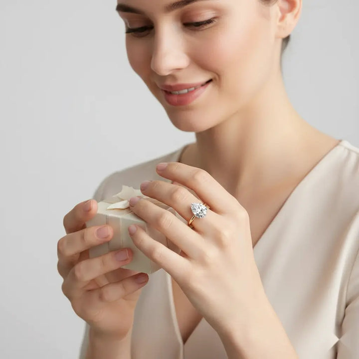 Pear 4 Claw Solitaire Engagement ring