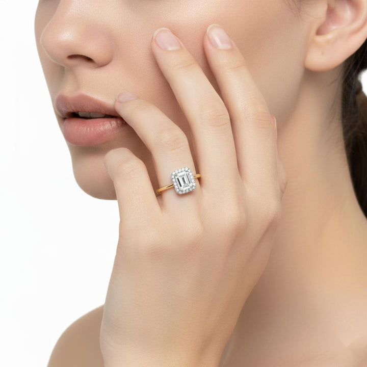 Emerald Solitaire with Halo Engagement ring