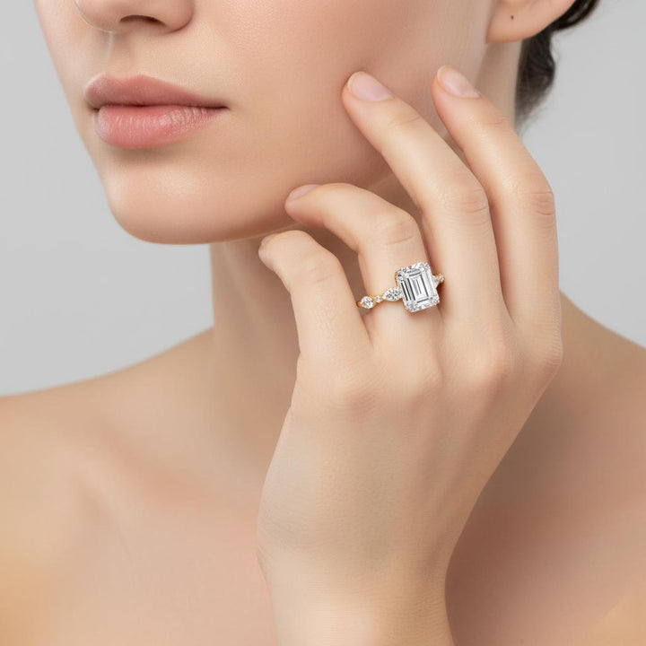 Emerald Solitaire With Accent Engagement Ring