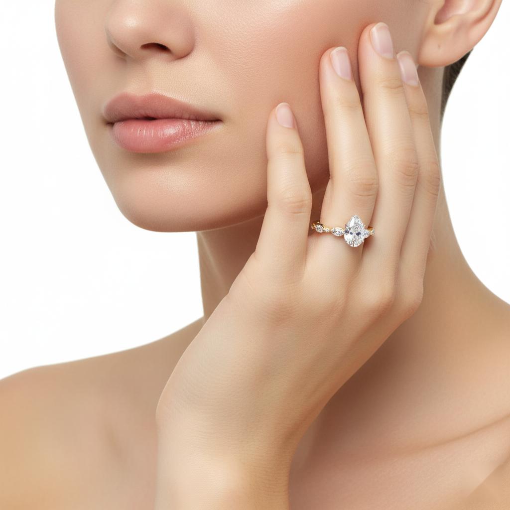 Pear Solitaire With Accent Engagement Ring