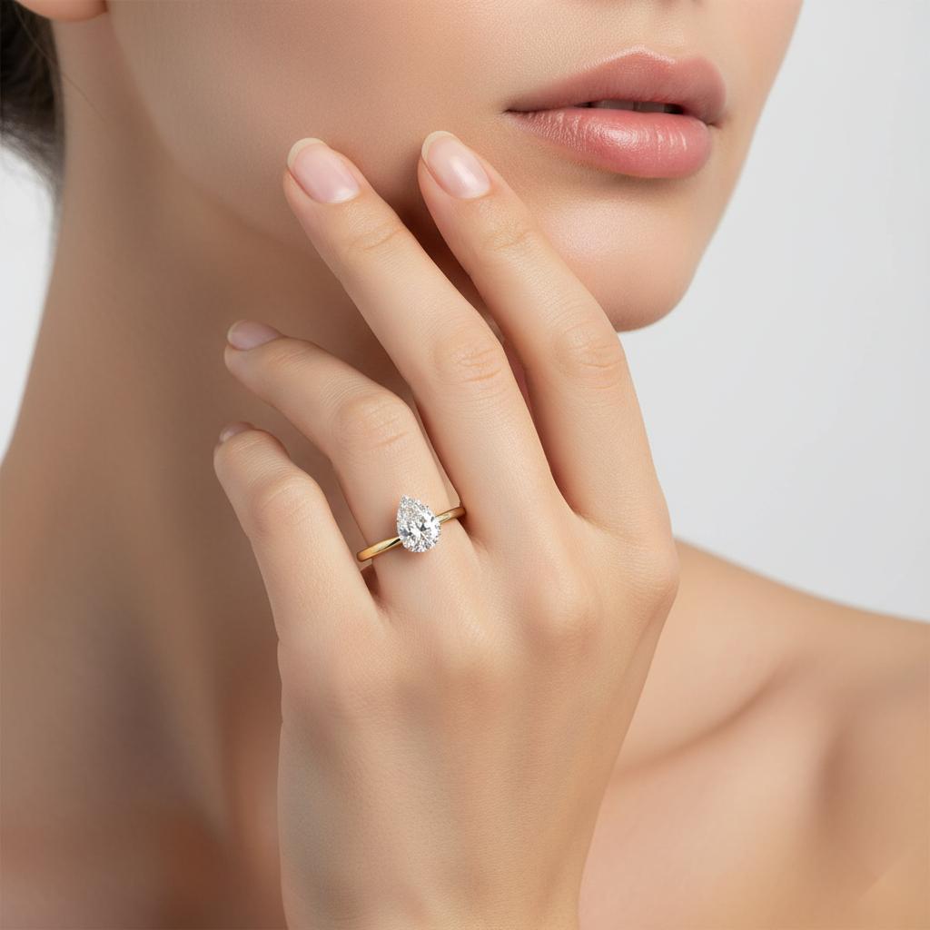 Pear Solitaire Cathedral Engagement Ring