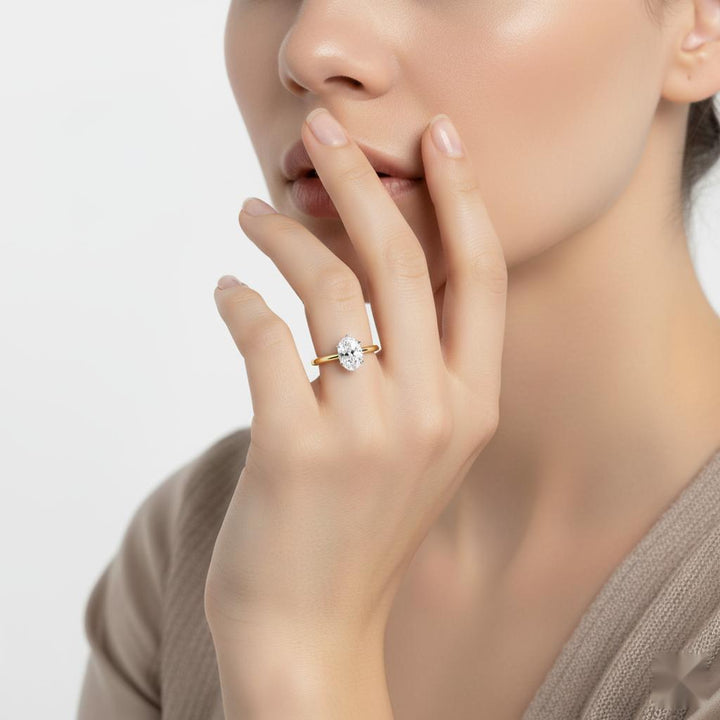 Oval Solitaire With Lotus Flower Prong Engagement Ring