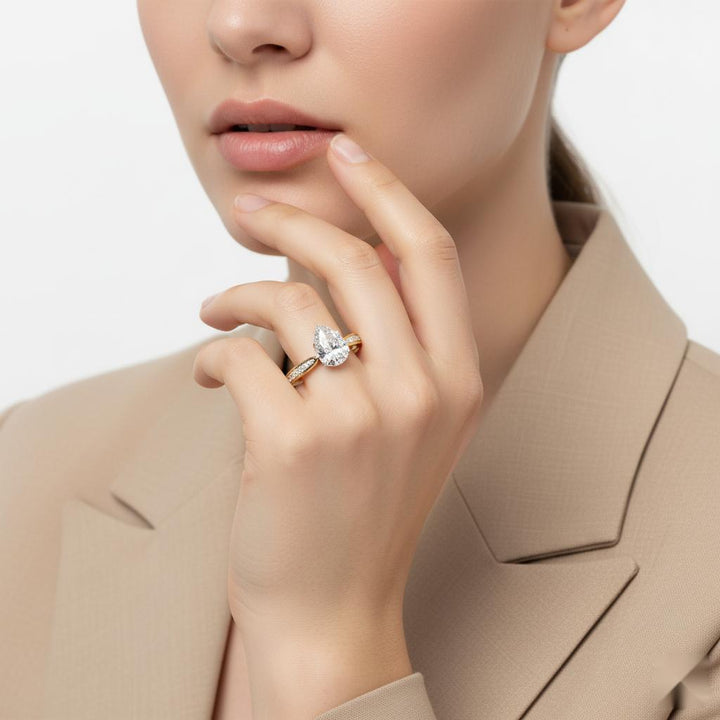 Pear Hidden Accent With Pointer Band Engagement Ring