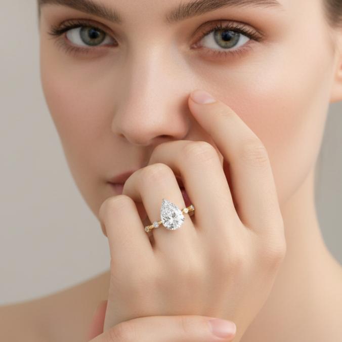 Pear Hidden Halo with Space Accent Engagement Ring