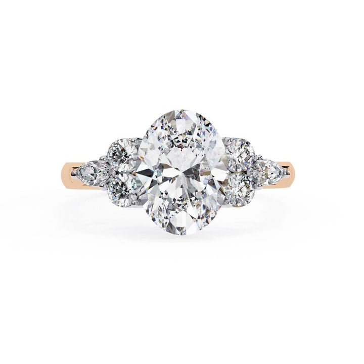 Oval with Round Three Stone Engagement ring