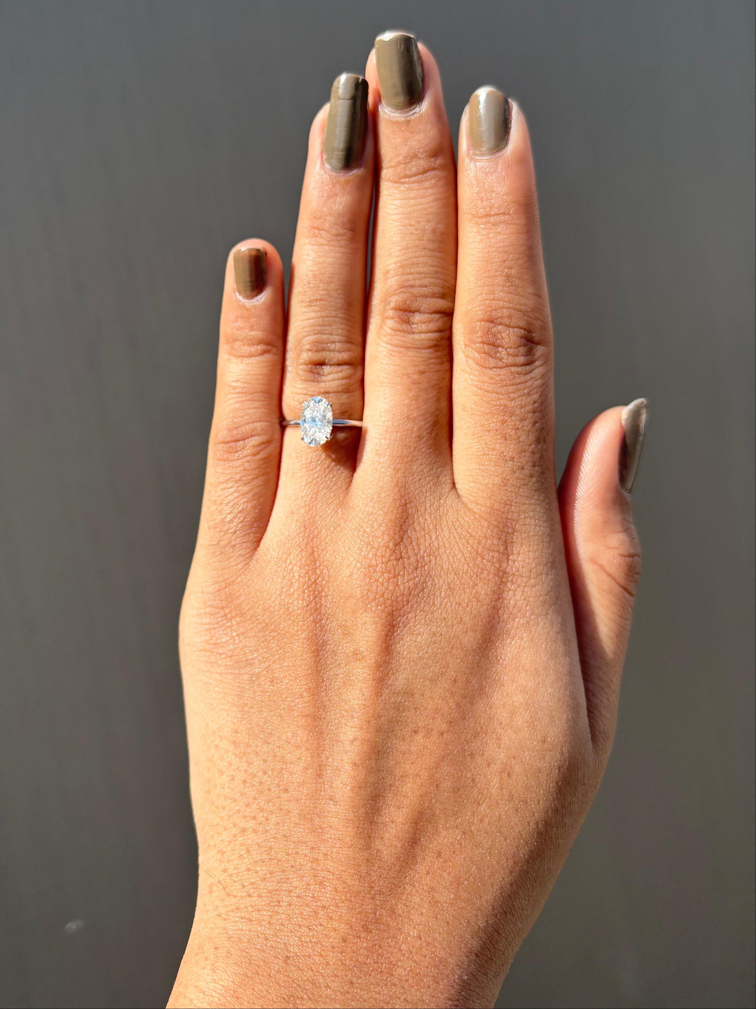 Oval Hidden Halo Engagement Ring