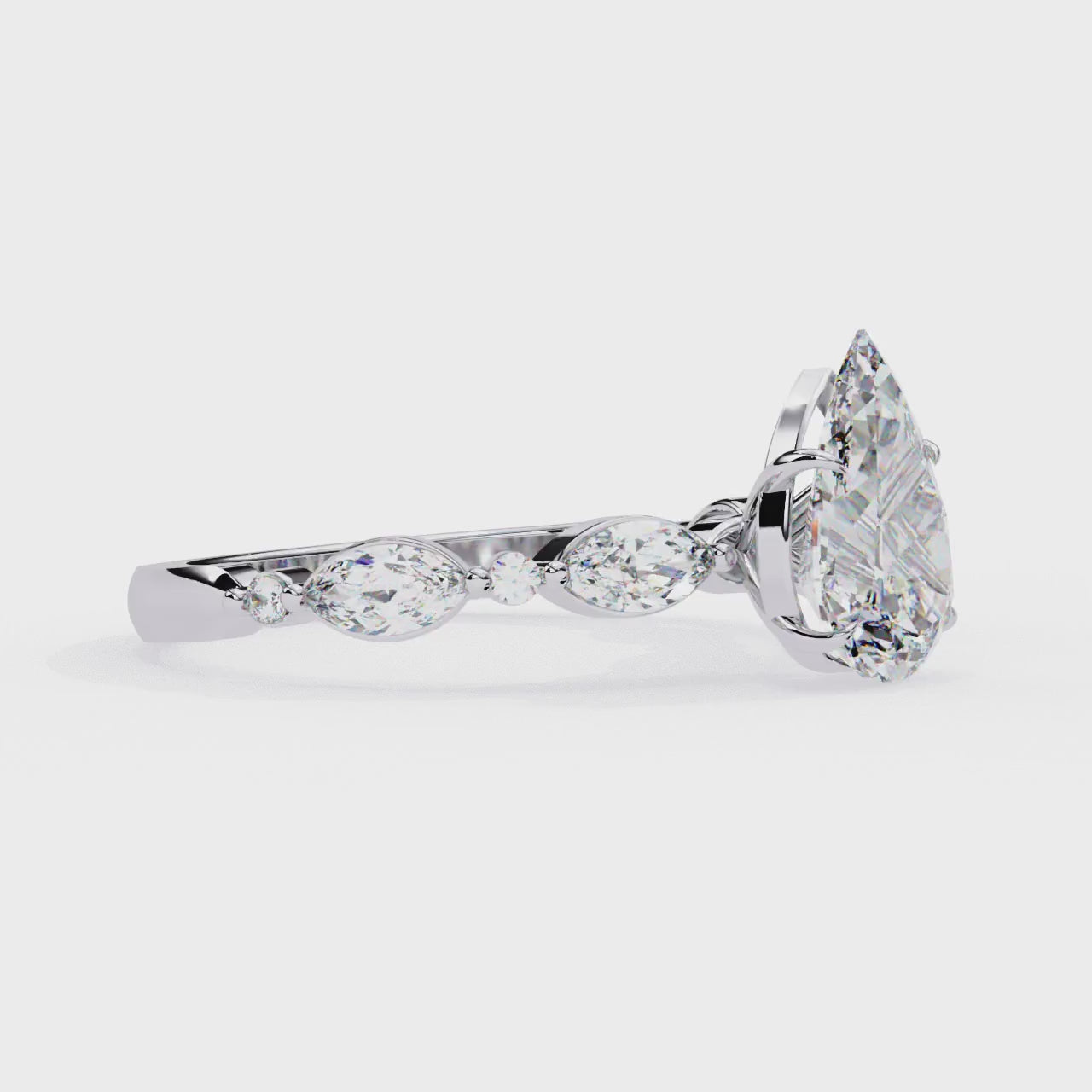 Pear Solitaire With Accent Engagement Ring