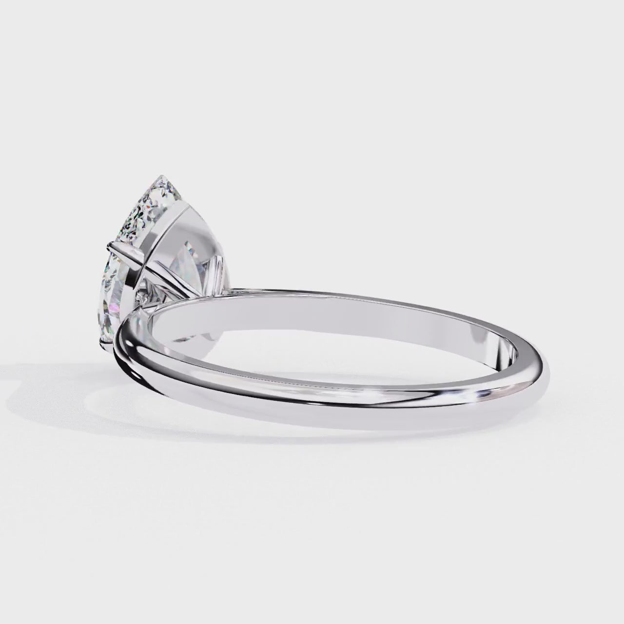 Pear 4 Claw Solitaire Engagement ring