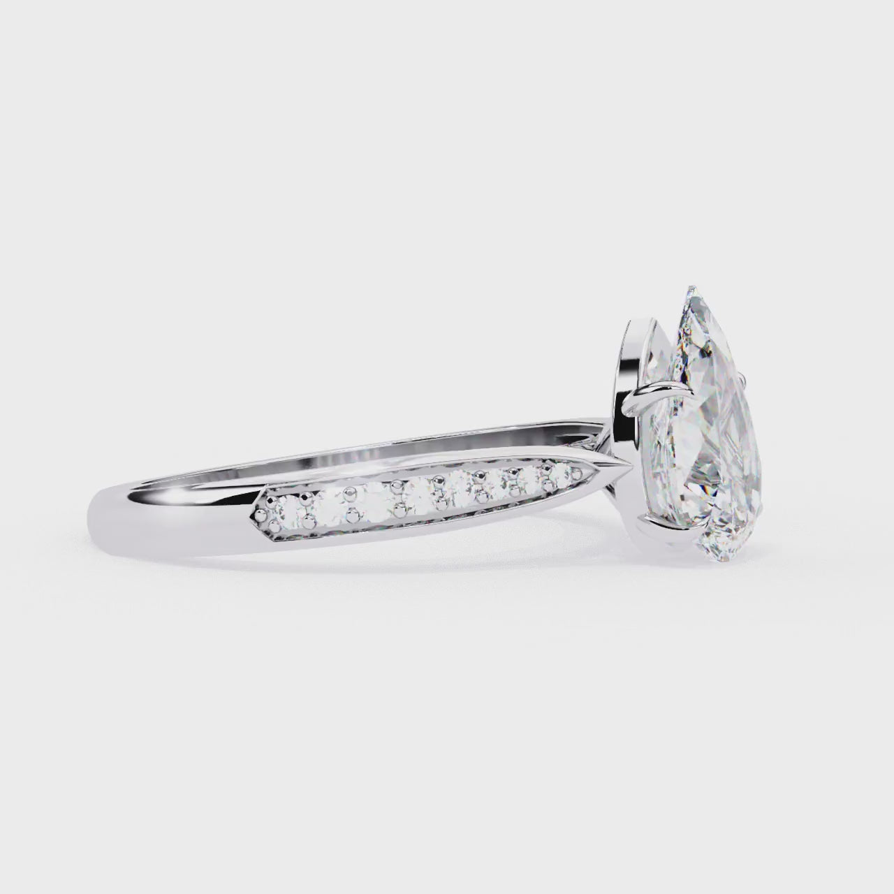 Pear Hidden Accent With Pointer Band Engagement Ring