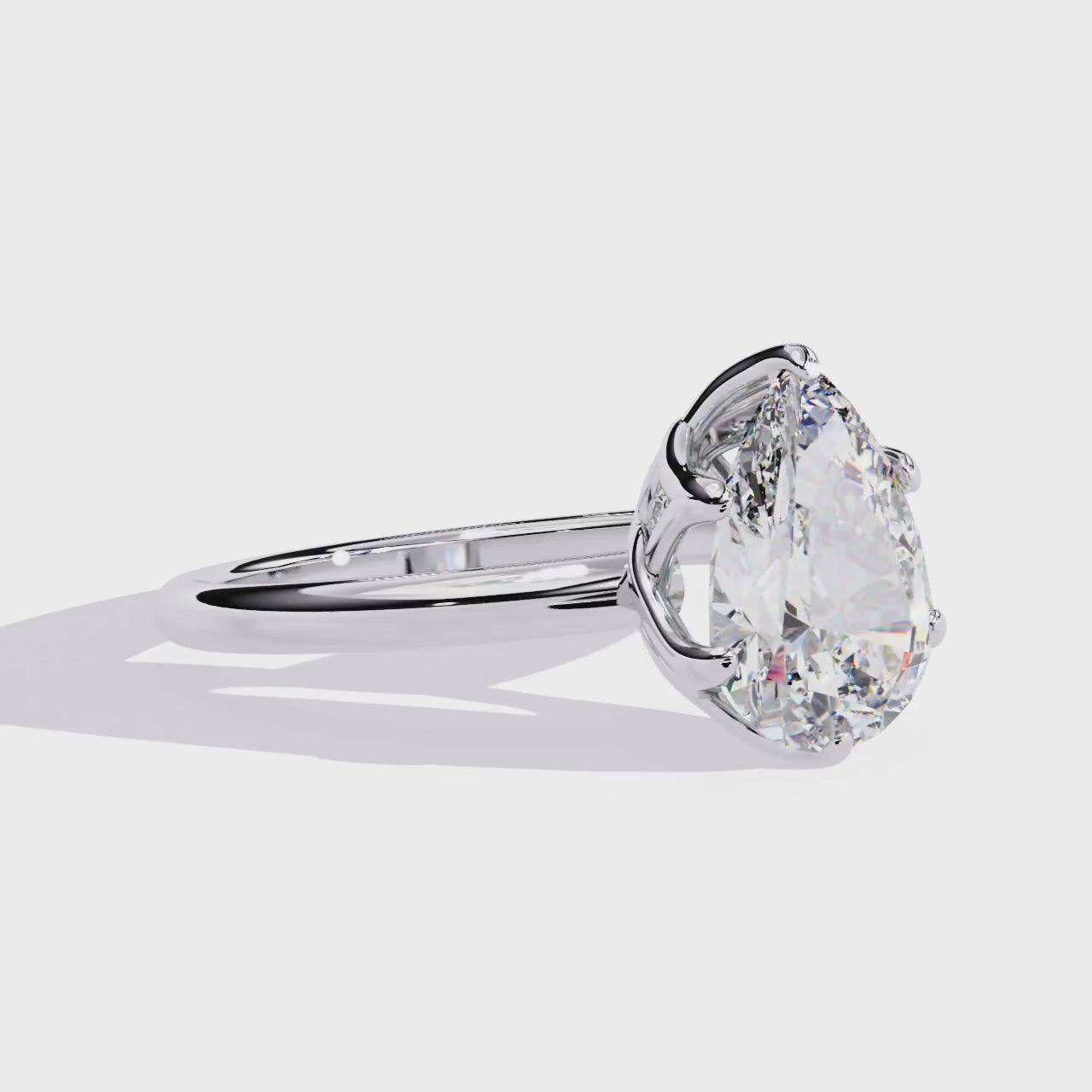 Pear Solitaire with Lotus Flower Prong Engagement Ring