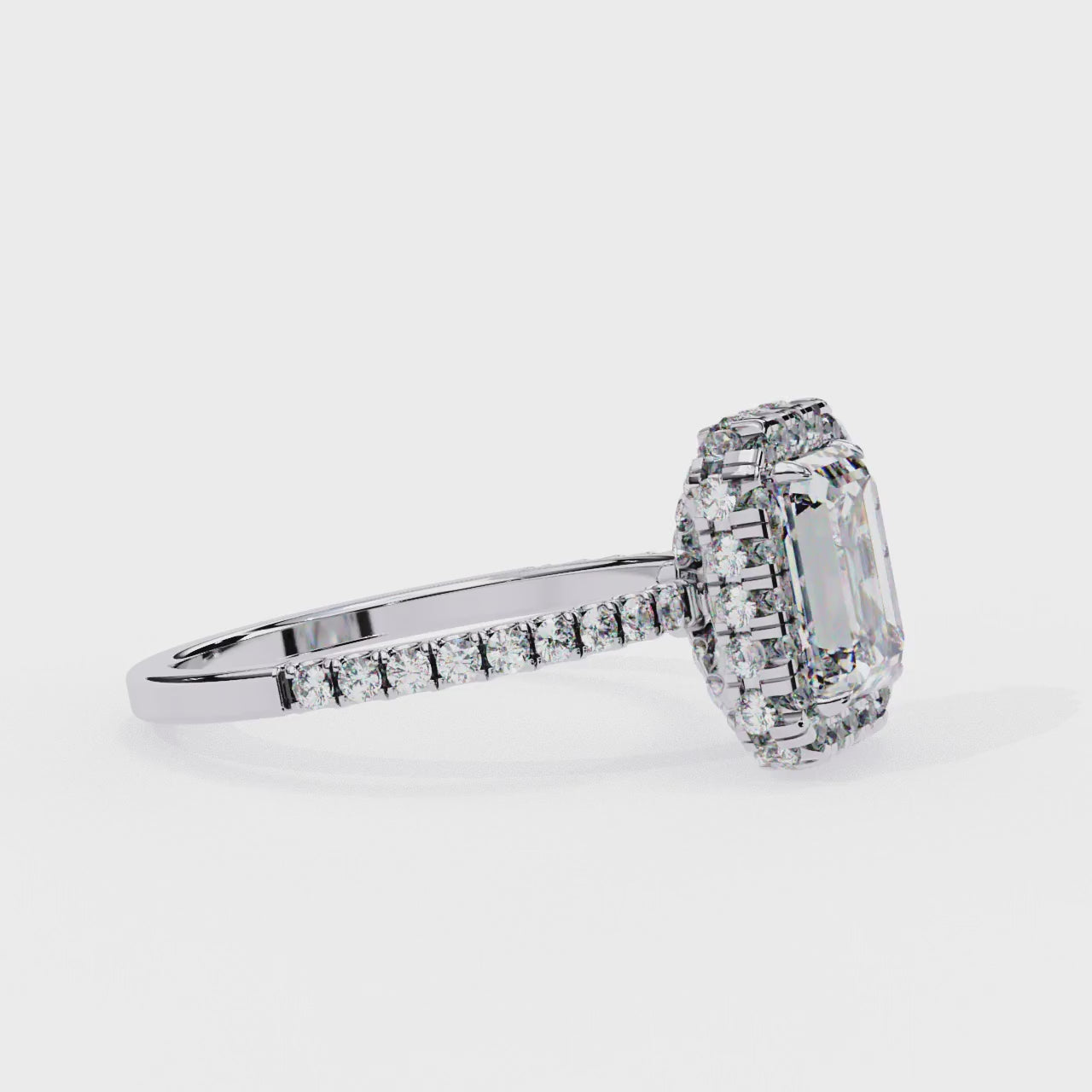 Emerald Unique Halo Engagement Ring