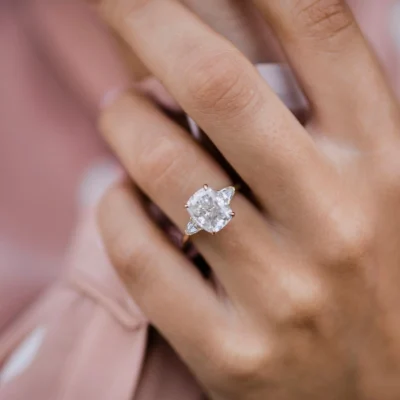 Elongated Cushion With Triangle Three Stone Engagement Ring 